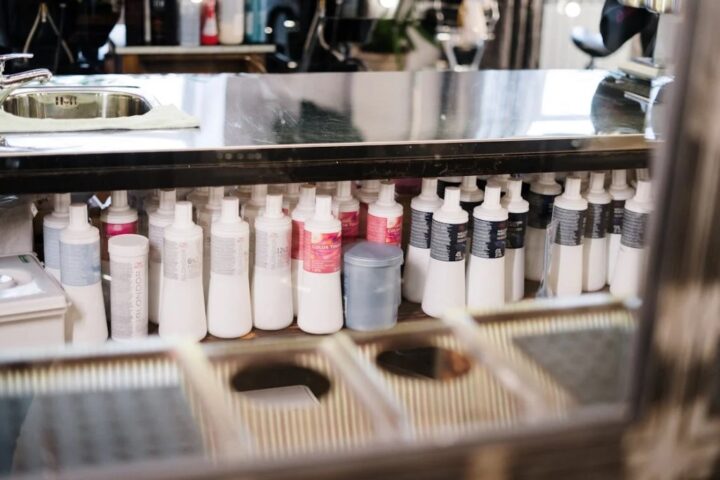 Representative image of White Plastic Bottles on Brown Metal Rack ,Photo Source: cottonbro studio (Pixabay)