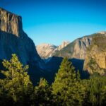 Representative Image. Landscape day view of Yosemite Valley with trees and blue sky. Photo Source: Pexels