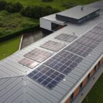 Metal roof with numerous solar panels. Photo Source - Perth Solar Warehouse