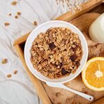 Representative image: Healthy breakfast muesli, milk, orange, and honey on a tray. Photo Source: bangalore digital marke