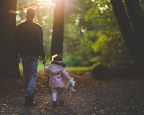 Father Daughter Forest Walk. Photo Source: negativespace