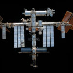 Representative Image: International Space Station (ISS) against the blackness of space. It features large solar panels, various interconnected modules, and docking ports for spacecraft. Photo Source: (nasa.gov)