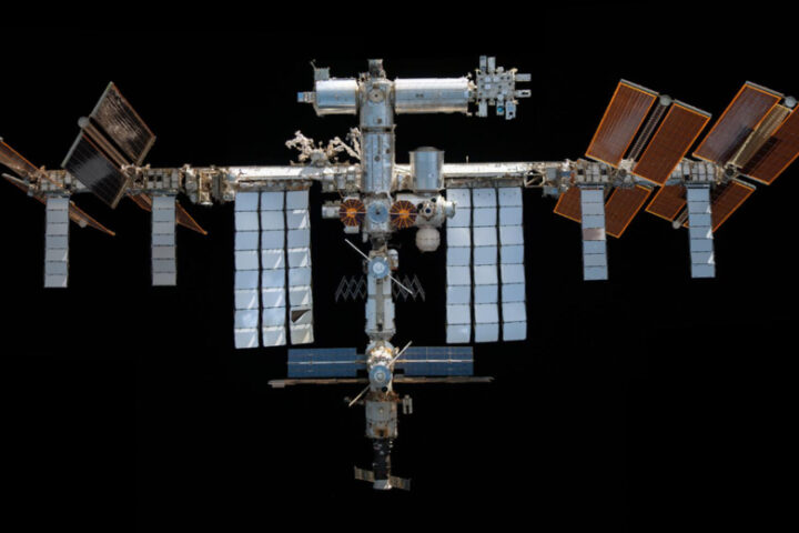 Representative Image: International Space Station (ISS) against the blackness of space. It features large solar panels, various interconnected modules, and docking ports for spacecraft. Photo Source: (nasa.gov)