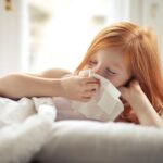 Representative Image. A person dealing with cold or cough. Photo Source - Andrea Picaquadio (Pexels)