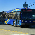 Representative image. Blue bus on road. Photo Source: Metropolitan Transportation Authority (CC BY 2.0).