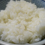 Representative image. cooked rice in white and blue ceramic bowl. Photo Source: pick pik (public domain).