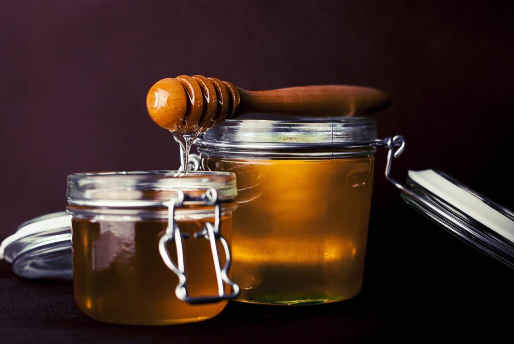 Representative image. Honey, Jar, Honey dipper image. Photo Source: Fancycrave.