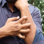 Man Scratching a Hand Photo Source:Towfiqu barbhuiya (Pexels)