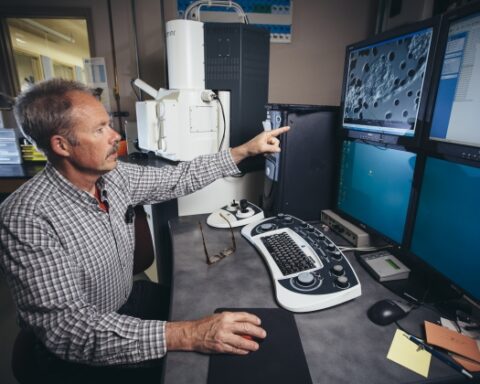 Individual pointing at one of the screen . Photo Source - Adrian Sanchez-Gonzalez (MSU)