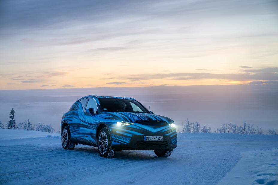 A blue car with a unique pattern parked on a snowy road. Photo Source - Mercedes Benz