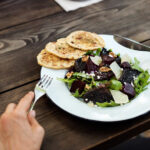 Representative image. Beets, cheese, crackers, outdoor dining. Photo Source: Rawpixel.com (CC0 1.0).