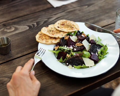 Representative image. Beets, cheese, crackers, outdoor dining. Photo Source: Rawpixel.com (CC0 1.0).