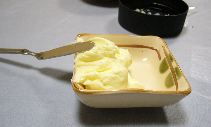 Representative image. Fresh butter in square dish. Photo Source: Searobin (CC BY-SA 3.0).