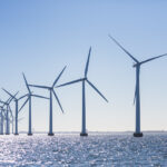 Representative Image. An array of offshore wind turbines standing tall in the ocean. Photo Source - European Wind Energy Association (CC BY-NC-ND 2.0)