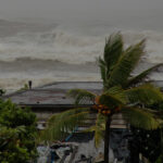 Representative Image: A powerful storm scene with rough ocean waves crashing in the background, indicating an intense cyclone or hurricane. EU Civil Protection and Humanitarian Aid (CC BY-ND 2.0)