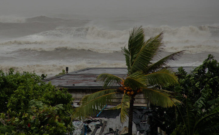 Representative Image: A powerful storm scene with rough ocean waves crashing in the background, indicating an intense cyclone or hurricane. EU Civil Protection and Humanitarian Aid (CC BY-ND 2.0)