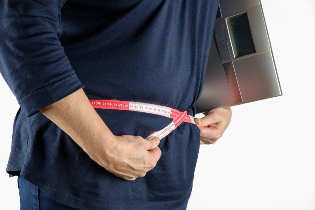 Representative Image. Measuring Belly with Measuring Tape.