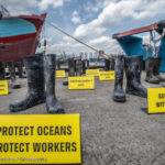 Boots to boost justice, Photo Source: Greenpeace