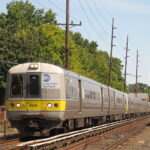 A Long Island Rail Road (LIRR) train in motion. Photo Source - AEMoreira042281 (CC BY-SA 3.0)