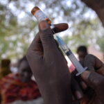 Representative Image health worker prepares a measles vaccine from a bottle, photo Source: UNICEF Ethiopia (CC BY-NC-ND 2.0)