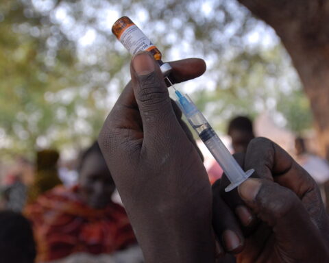 Representative Image health worker prepares a measles vaccine from a bottle, photo Source: UNICEF Ethiopia (CC BY-NC-ND 2.0)