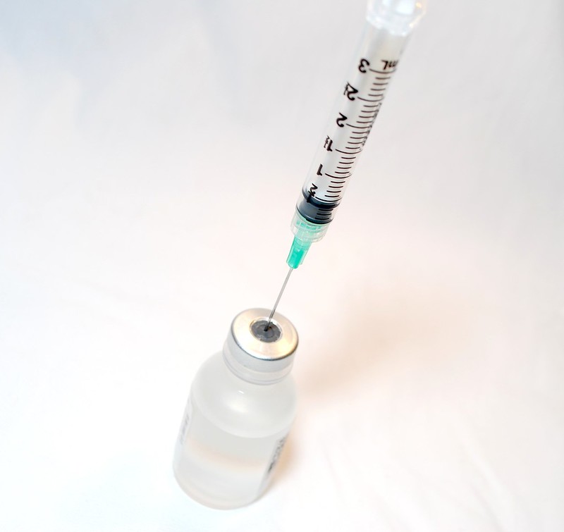 Representative Image: Syringe and Vaccine. Photo Source NIAID (CC BY 2.0)