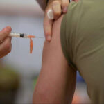 Representative Image: A person receiving an injection in the upper arm, likely a vaccine. Photo Source: NARA & DIVIDS Public Domain archive. Defense Visual Information Distribution Service