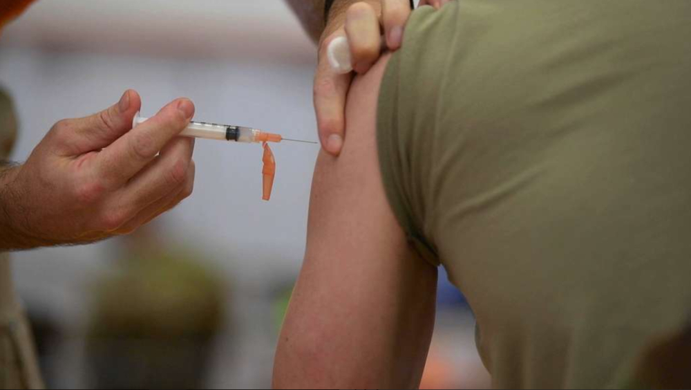 Representative Image: A person receiving an injection in the upper arm, likely a vaccine. Photo Source: NARA & DIVIDS Public Domain archive. Defense Visual Information Distribution Service