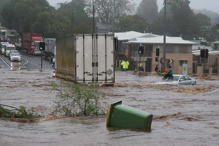 Representative Image: Trapped woman on a car roof during flash flooding in Toowoomba, Photo Source: Timothy Swinson (CC BY 2.0)