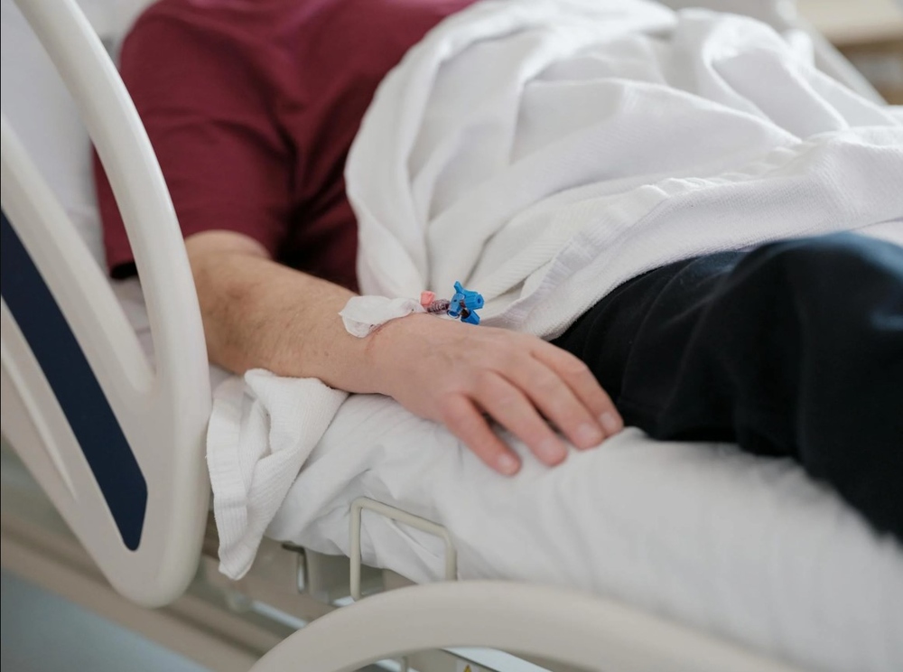 Representative Image: Person Lying Down On a Hospital Bed. Photo Source: Engin Akyurt (Pexels)